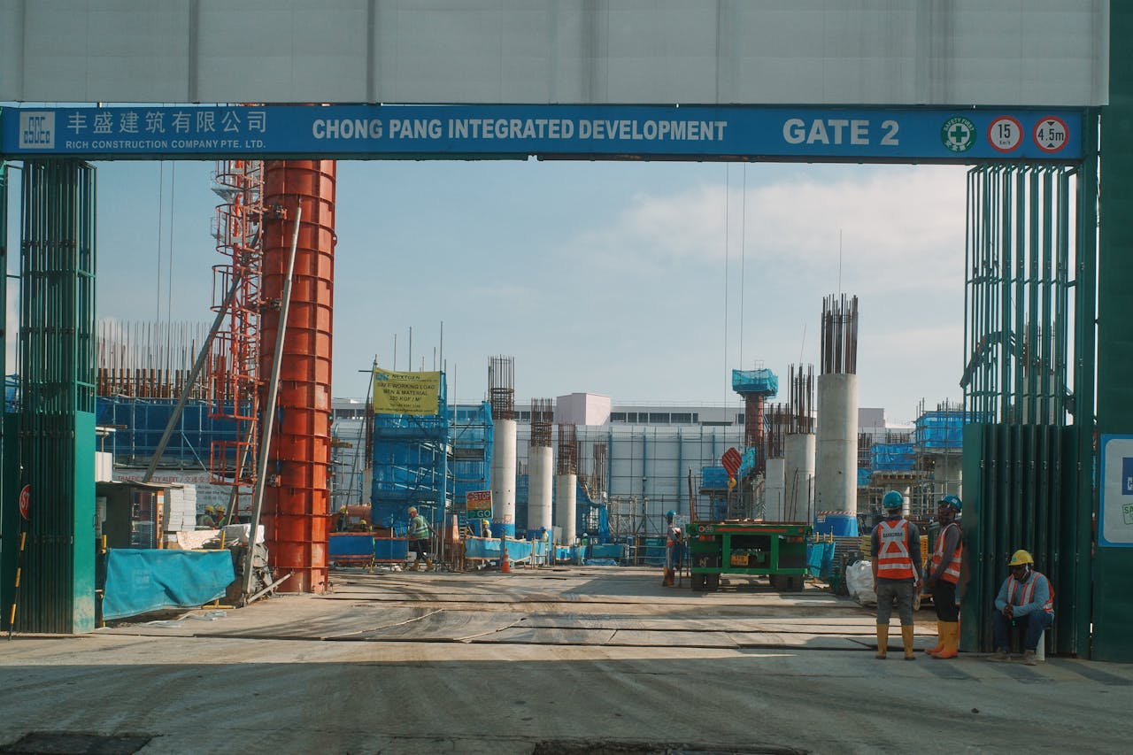Industrial construction activity at the Chong Pang Integrated Development, showcasing structural work.